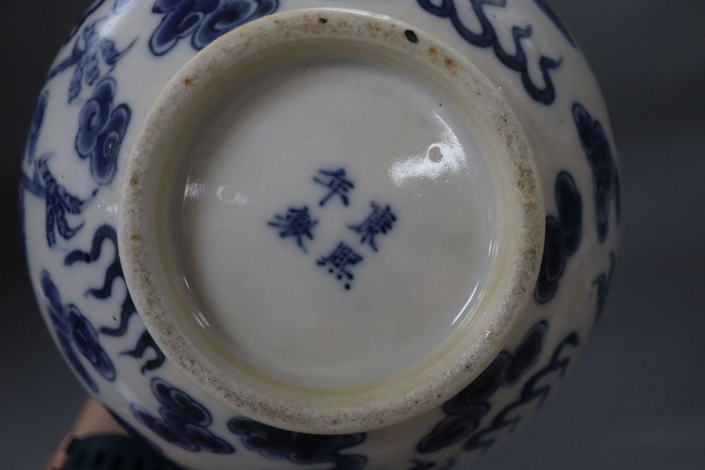 A Chinese blue and white dragon bottle vase, with Kangxi mark, height 32cm